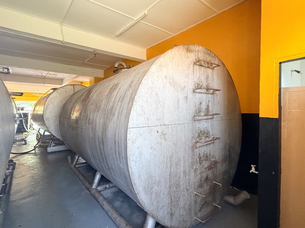 The end of a stainless steel storage tank in the MSR warehouse